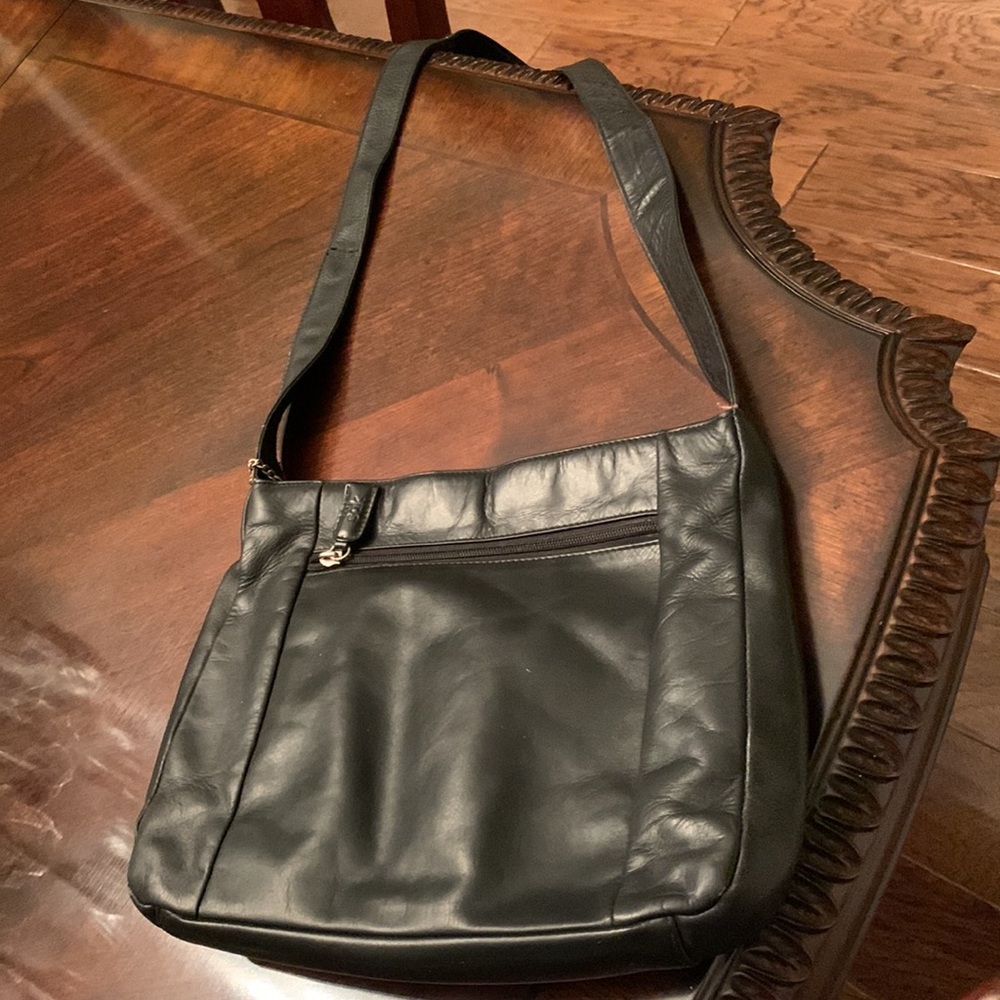 The Sak Black Pure Leather Crossbody Purse.